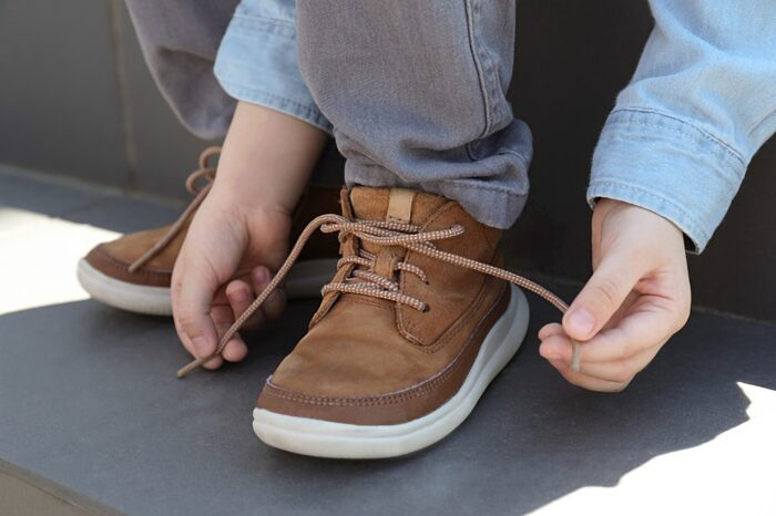 Faire ses lacets seul